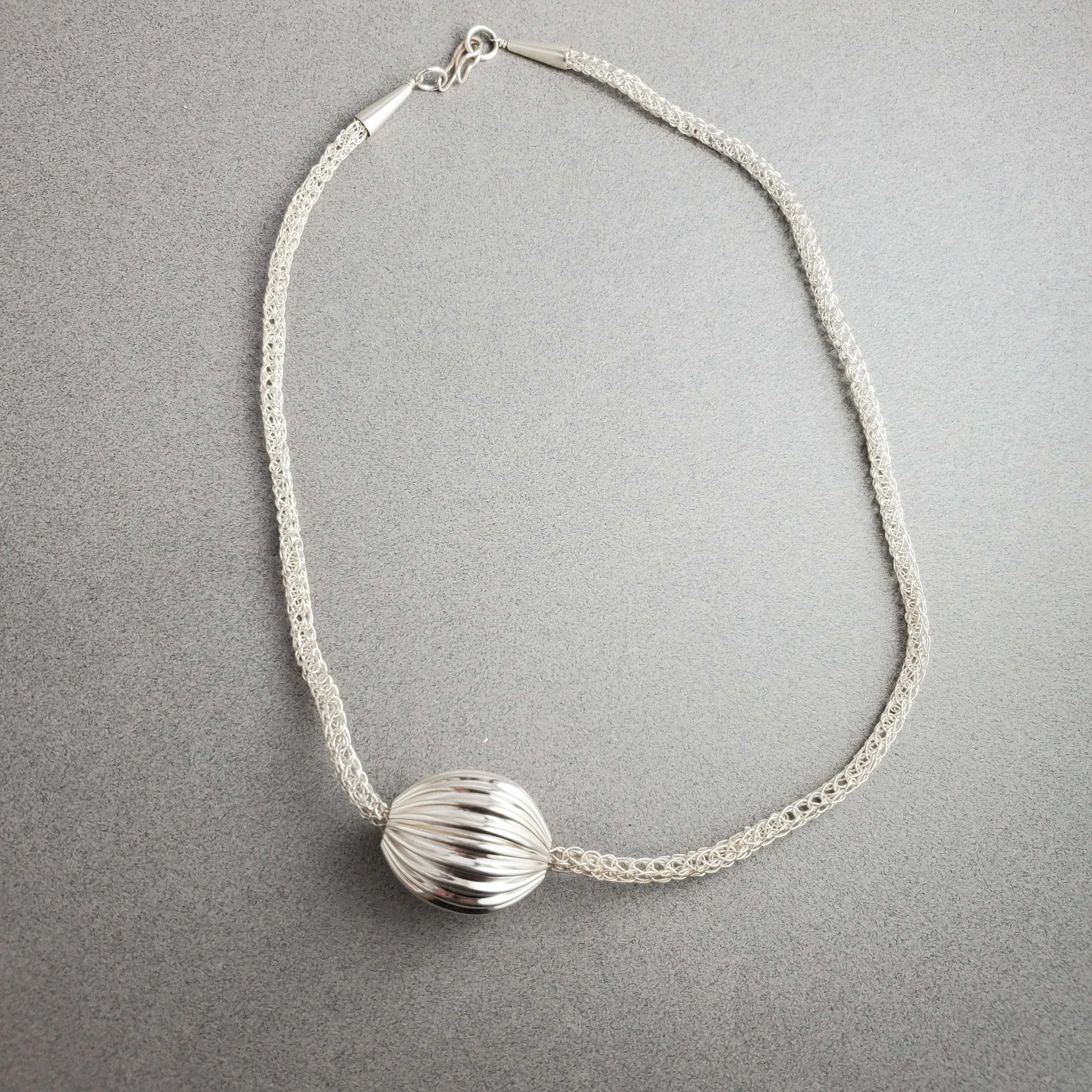Asymmetrical Pleated Hollow Silver Bead on Handmade Woven Necklace, Fold Formed Silver Necklace, Viking Knit Chain and Fine Silver Ball