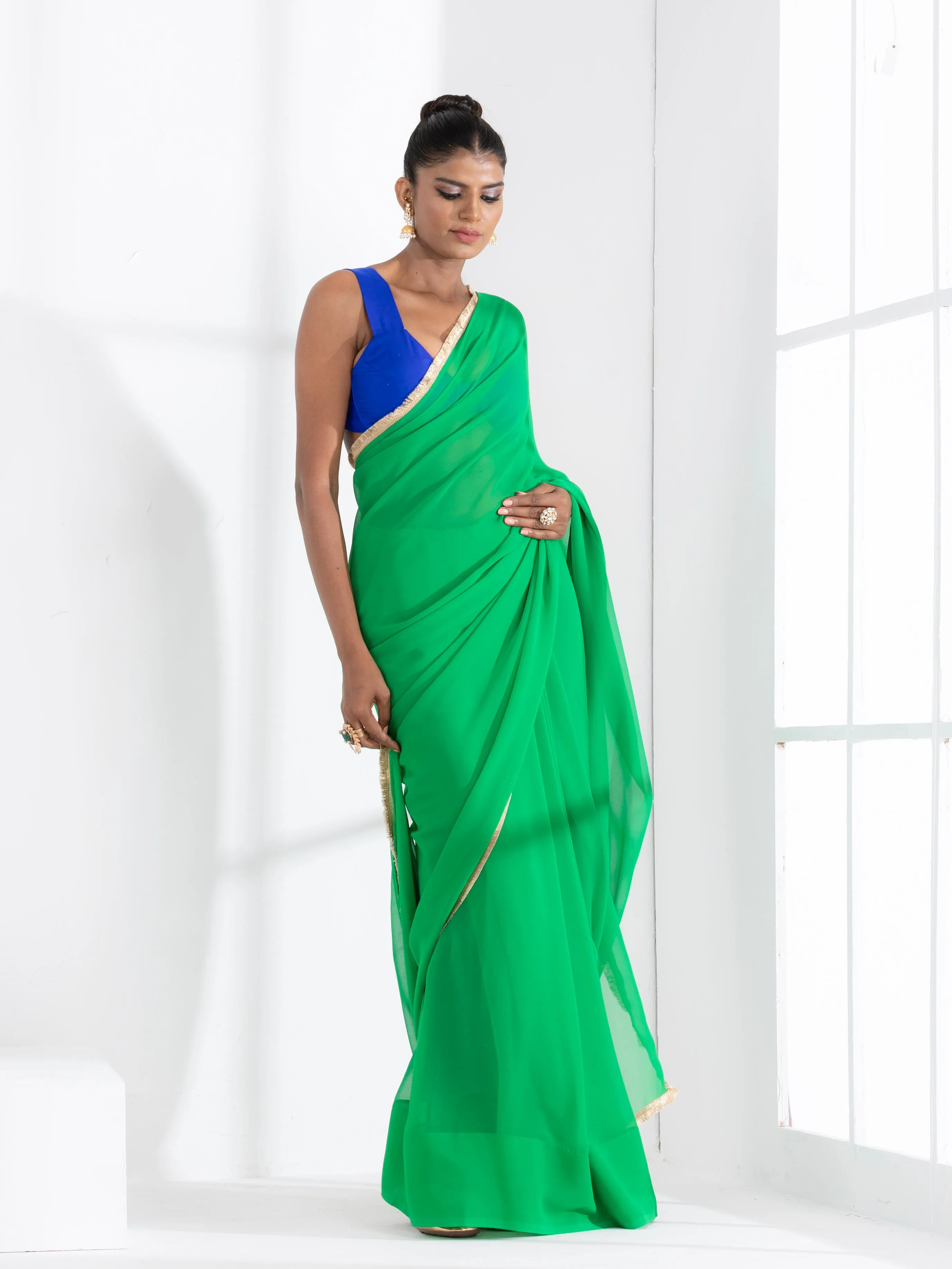 Irish Green Georgette Saree with Lace and Blue Posh Blouse Fabric