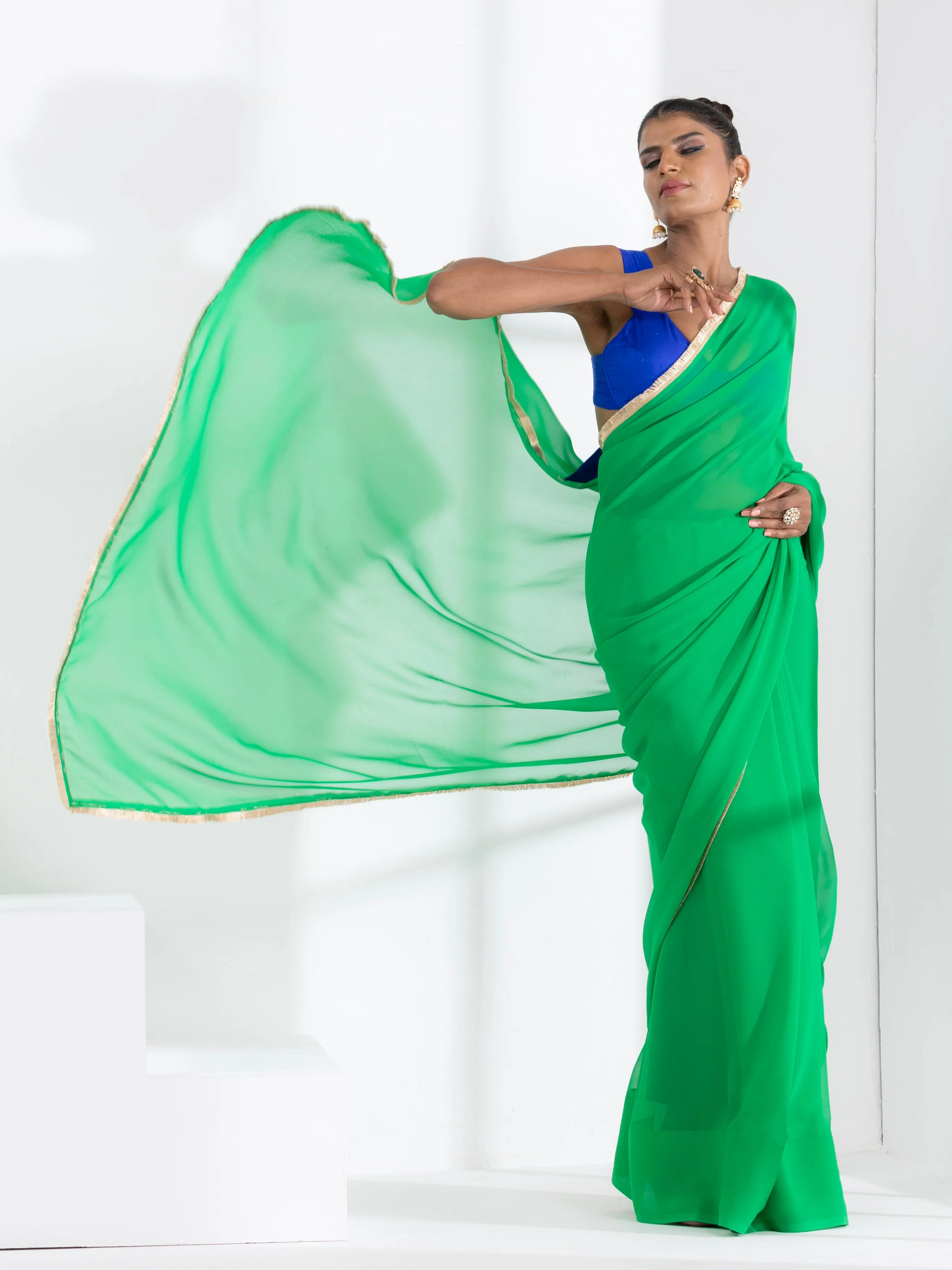 Irish Green Georgette Saree with Lace and Blue Posh Blouse Fabric