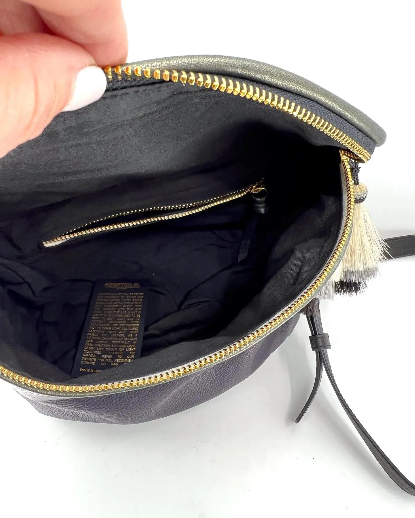 KEMPTON & CO. PERFORATED LEATHER TASSEL SHOULDER BAG