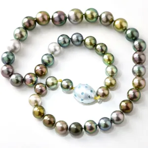Round Tahitian Pearls with a Gem Tahitian Pearl Clasp