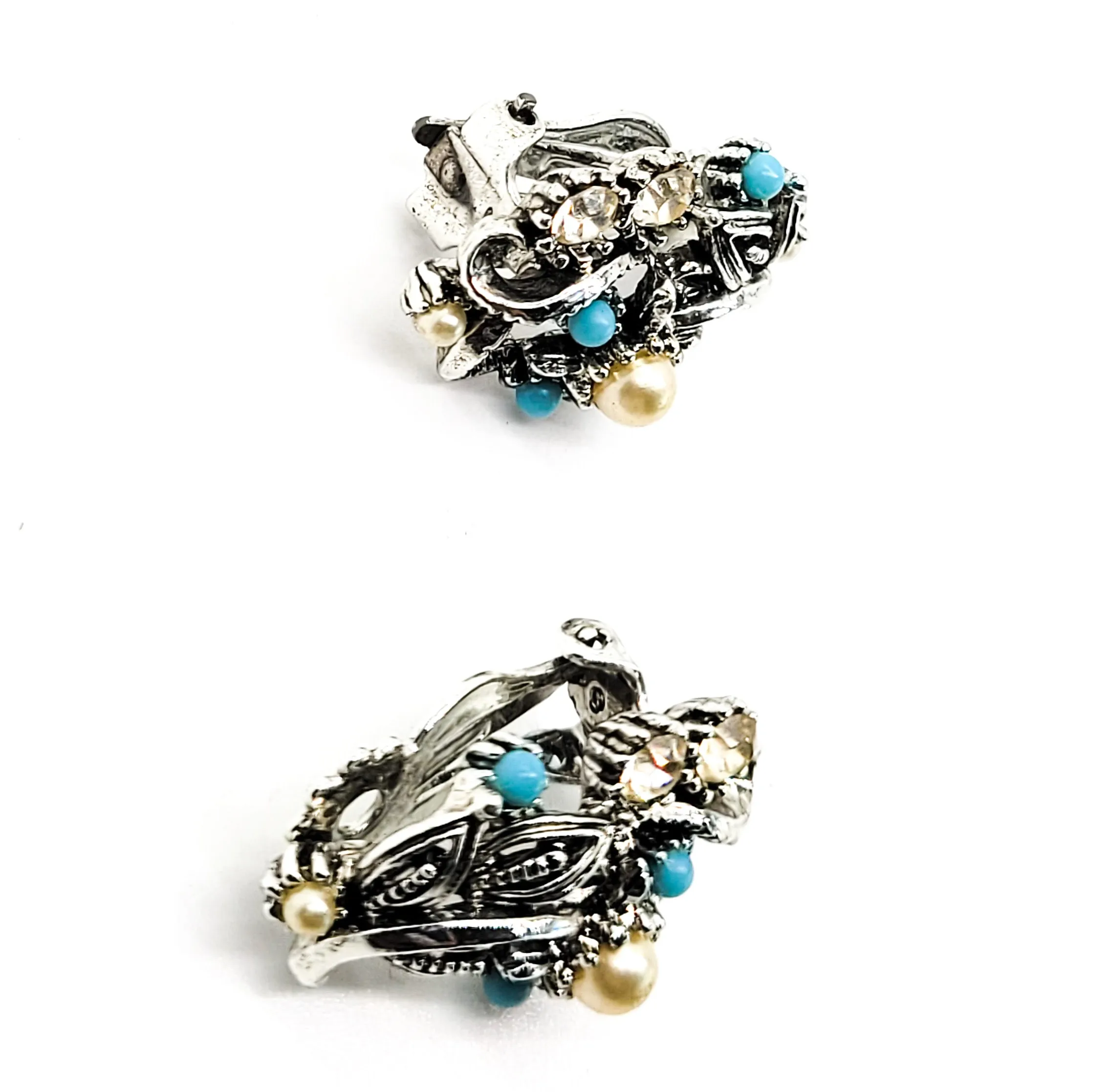 Star signed baby blue silver toned vintage flower earrings with faux pearl accents.