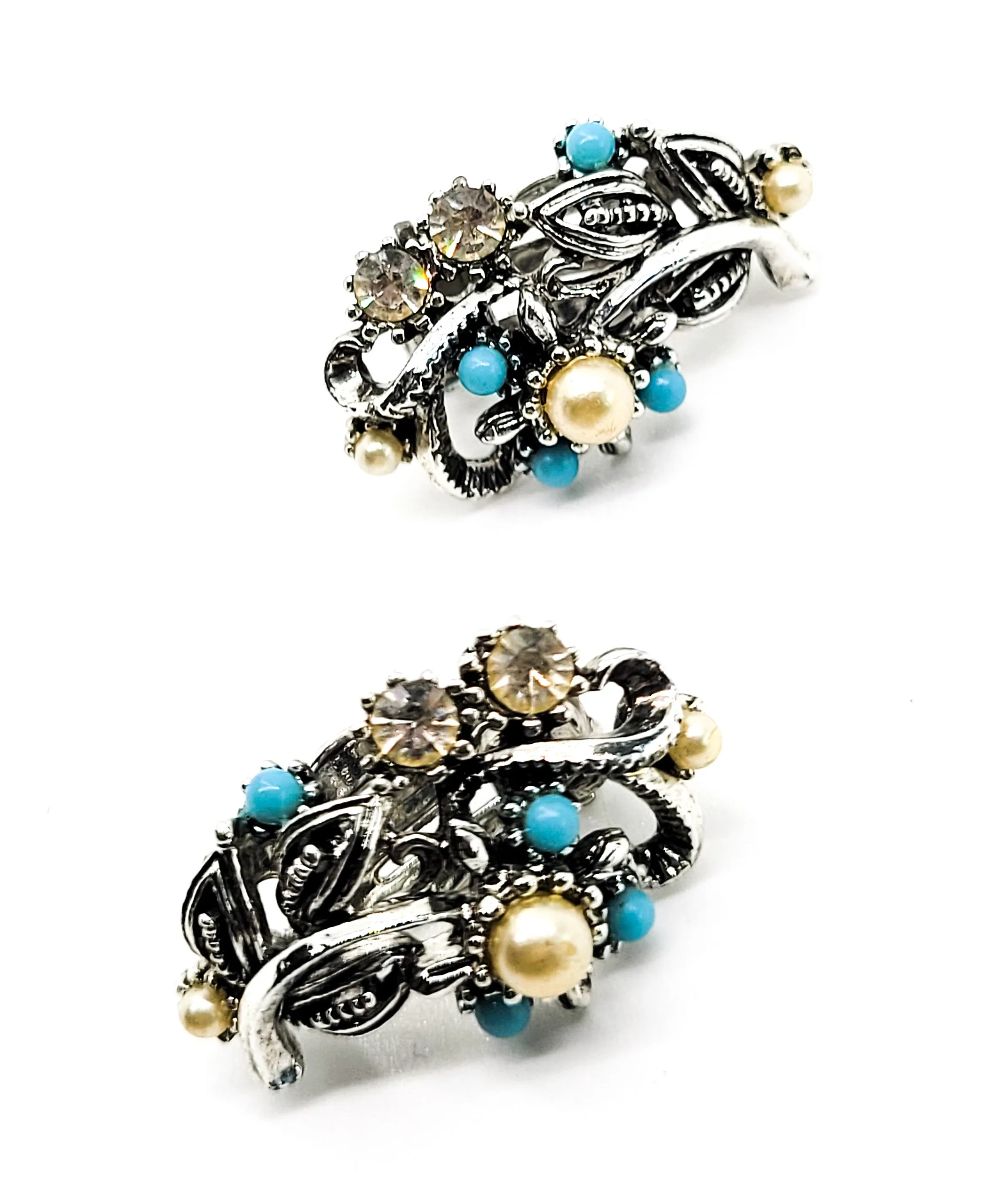 Star signed baby blue silver toned vintage flower earrings with faux pearl accents.