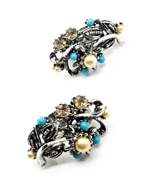 Star signed baby blue silver toned vintage flower earrings with faux pearl accents.