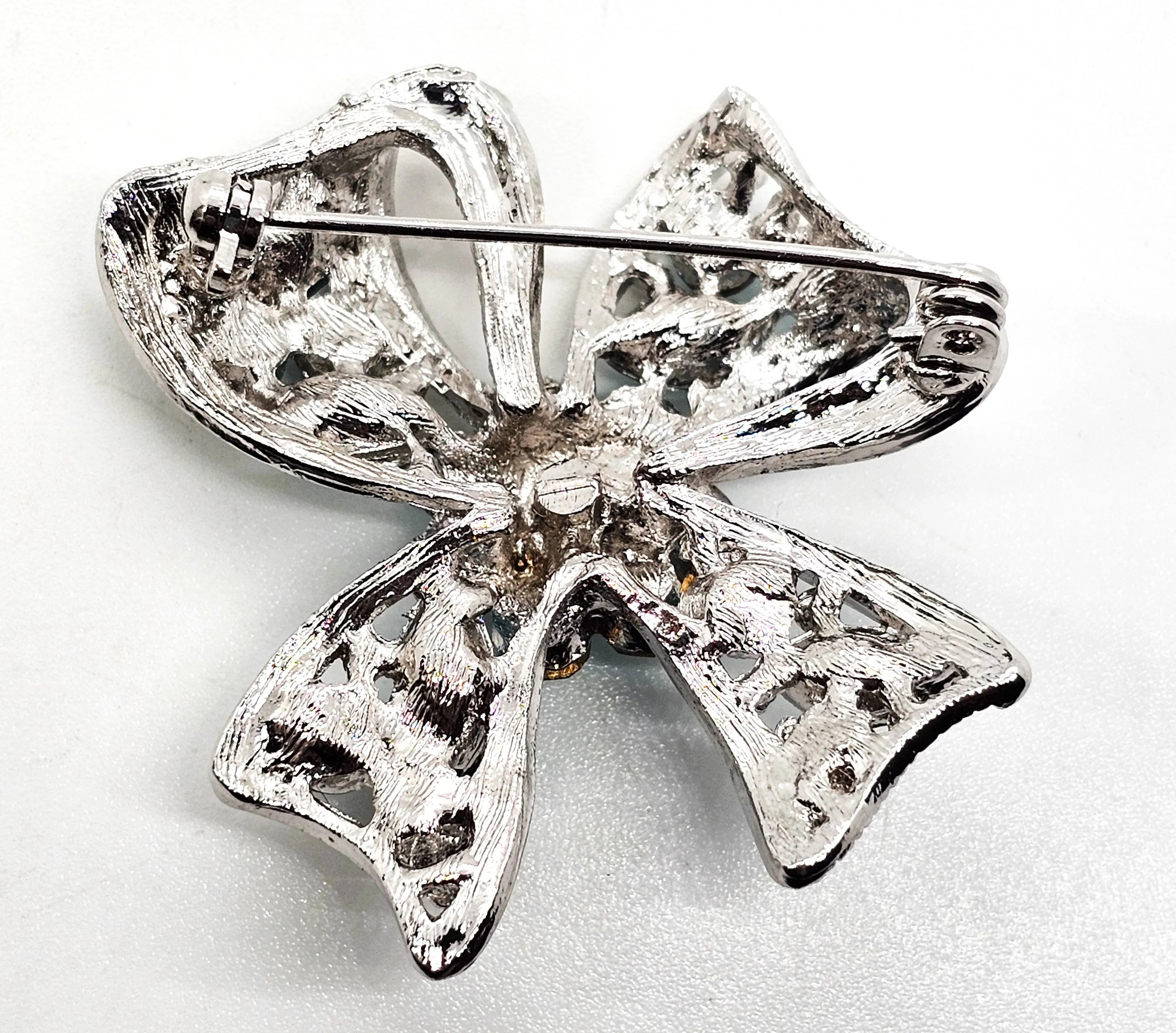 Teal and Aqua blue rhinestone silver toned vintage flower bow brooch