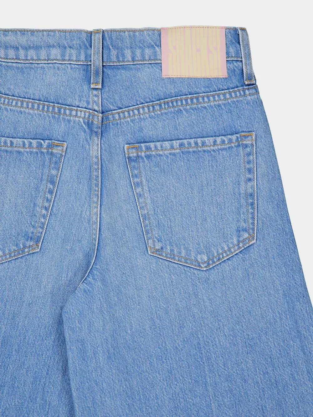 The Slung Sugar Cone Sneak Jeans