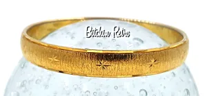 Vintage Monet Etched Starburst Bangle with Mid Century Modern Style